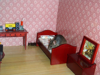 mouse in dollhouse bedroom