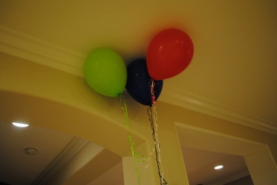 party balloons floating to ceiling